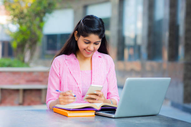 istock Student Sitting On Campus stock photo 1211976980