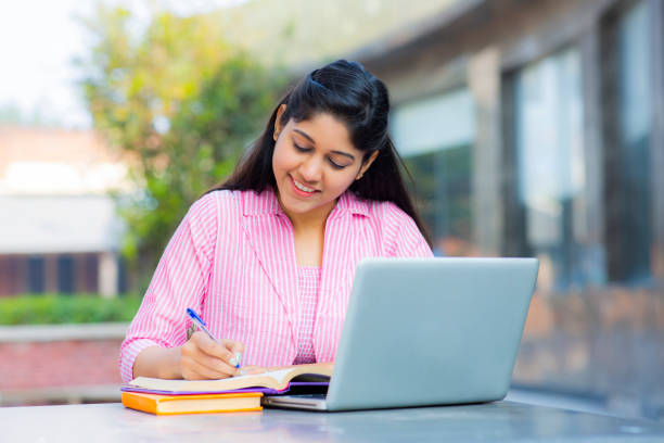 istock Student Sitting On Campus stock photo 1211977104