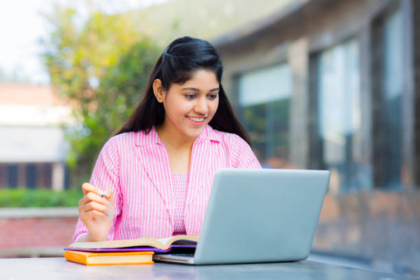 istock Student Sitting On Campus stock photo 1211977135