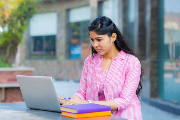 istock Student Sitting On Campus stock photo 1211977175