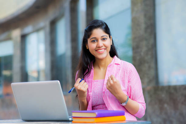 istock Student Sitting On Campus stock photo 1211977424
