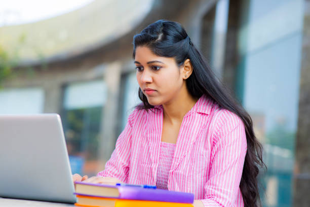 istock Student Sitting On Campus stock photo 1211977589