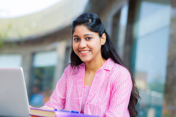 istock Student Sitting On Campus stock photo 1211977658
