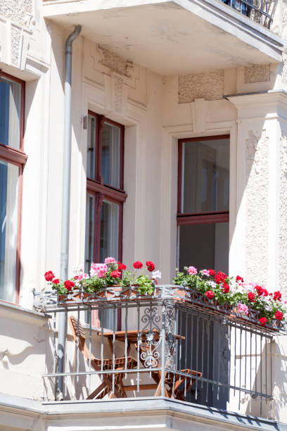 istock Small balcony with geranium flowers in Potsdam 1211978523