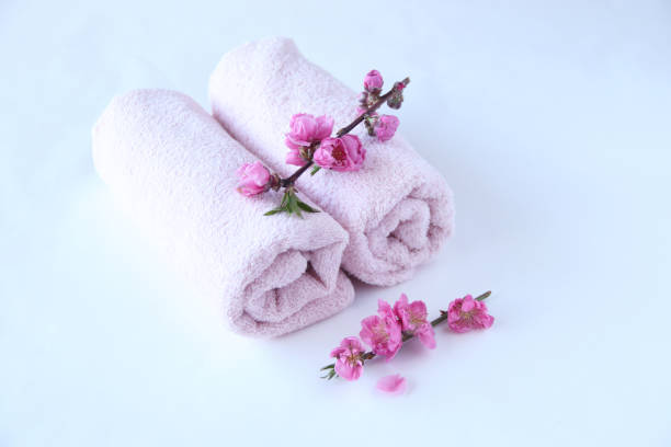 istock towel and peach flower 1211978688