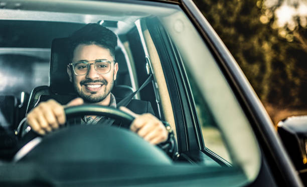 istock Middle Eastern Businessman Driving A Car. 1211979956