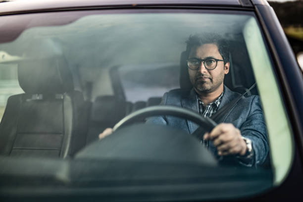 istock Middle Eastern Businessman Driving A Car. 1211980141