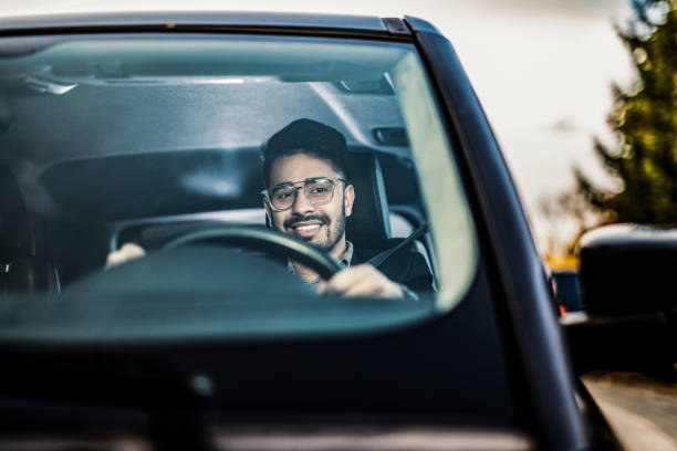 istock Middle Eastern Businessman Driving A Car. 1211980366