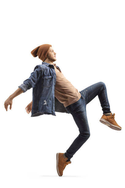 istock Young male dancer in casual clothes dancing 1211981364
