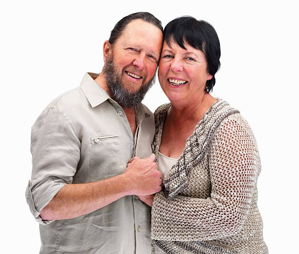 istock Retired elderly couple smiling together isolated on white 121198141
