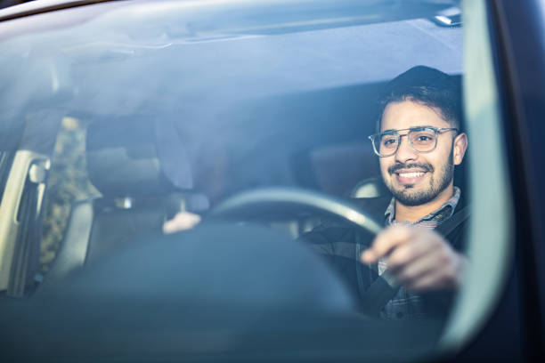 istock Middle Eastern Businessman Driving A Car. 1211981513