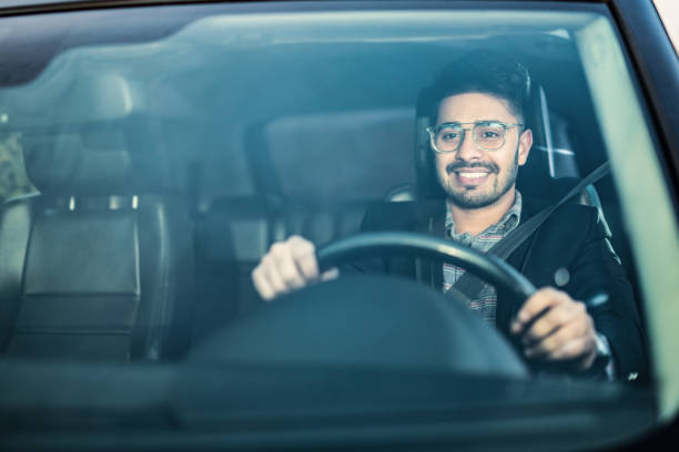 istock Middle Eastern Businessman Driving A Car. 1211982026