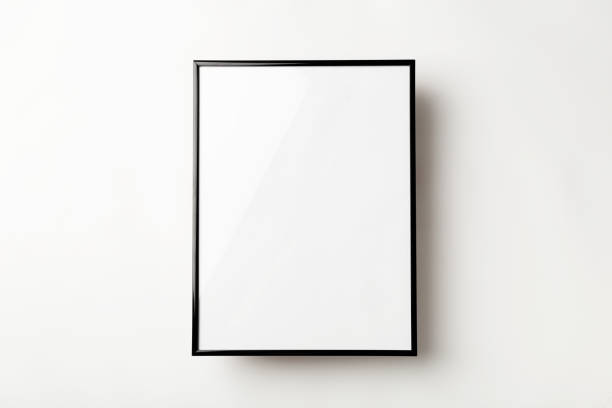 Empty photo frame on a white backgrounds. Copy space concepts Empty photo frame on a white backgrounds. Copy space concepts poster photos stock pictures, royalty-free photos & images