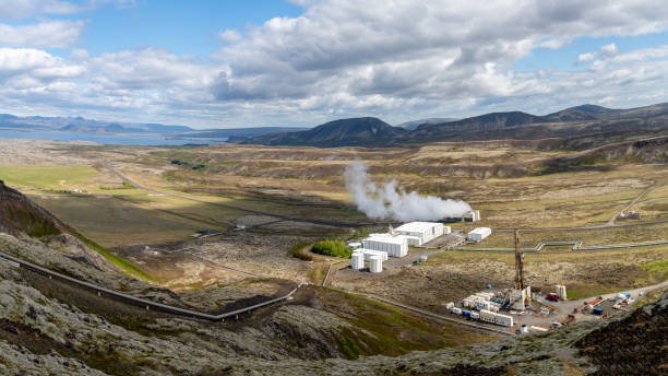 Nesjavellir geothermal facilities in Iceland Nesjavellir geothermal facilities in Iceland. Geothermal area with boiling mudpools and steaming fumaroles in Iceland geothermal reserve stock pictures, royalty-free photos & images