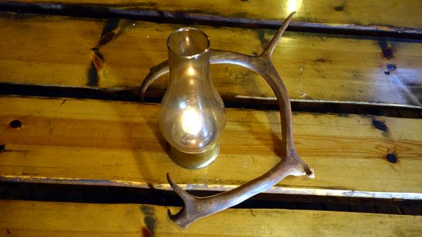 istock An oil lamp and a reindeer horn 1211984823