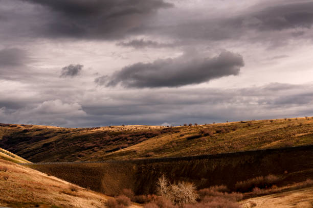 istock Eastern Oregon high desert rolling hills under cloudy skies 1211985094