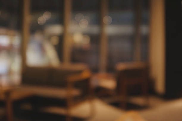 istock Blurred background of Cafe with abstract bokeh light. 1211987473