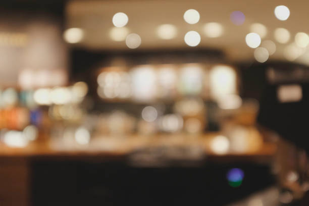 istock Blurred background of Cafe with abstract bokeh light. 1211987488