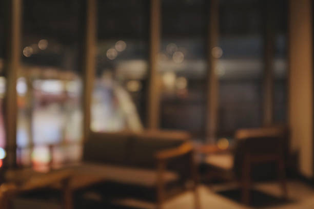 istock Blurred background of Cafe with abstract bokeh light. 1211987498