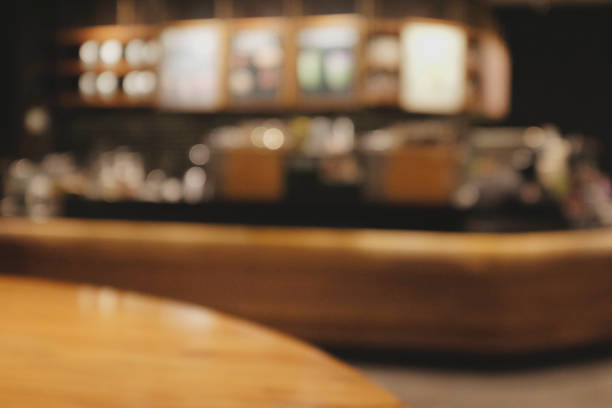 istock Blurred background of Cafe with abstract bokeh light. 1211987549