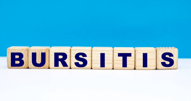 istock concept word bursitis on cubes on a blue background 1211987837