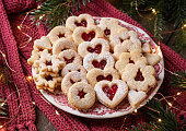 Traditional Linzer Christmas cookies filled with marmalade