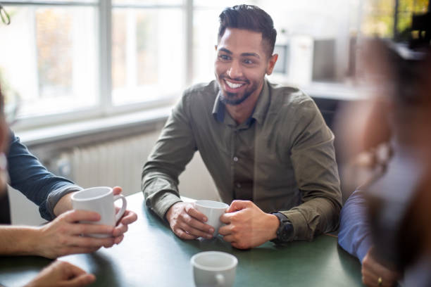 istock Group of business people having a coffee break 1211994287