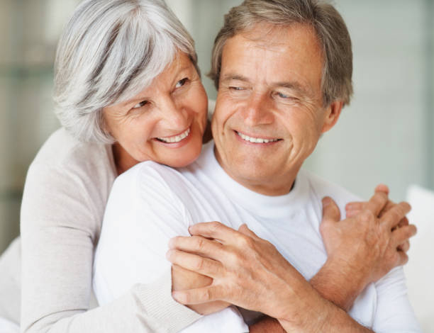 istock Cute elderly couple hugging each other 121199685
