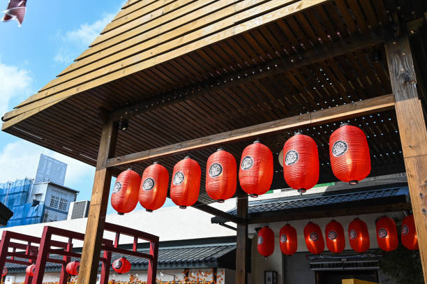 istock Taoyuan, Taiwan - Oct 11, 2019: Red lantern hanging in torii. 1211998127