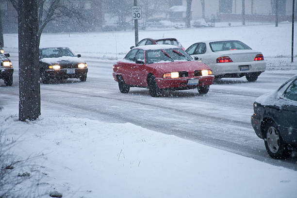 istock cars driving in the snow 121199901