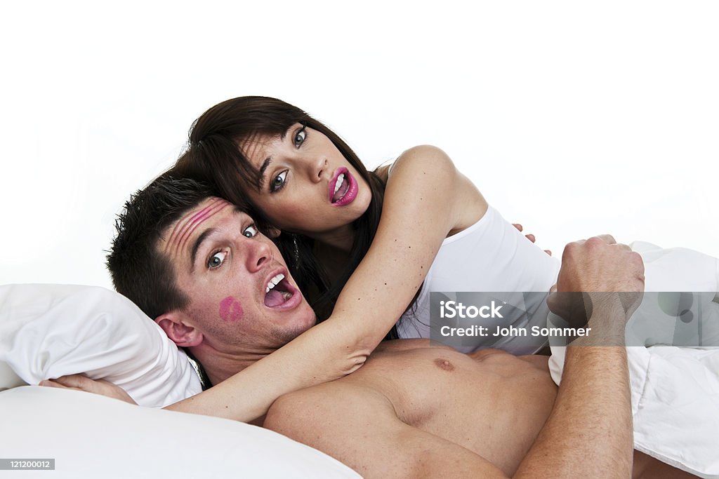 Couple caught in the act Couple in bed caught in the act 20-29 Years Stock Photo