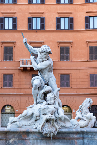is the fountain located in Piazza Navona, Rome, Italy. Neptune battles an Antonio della Bitta octopus in white Carrara marble.