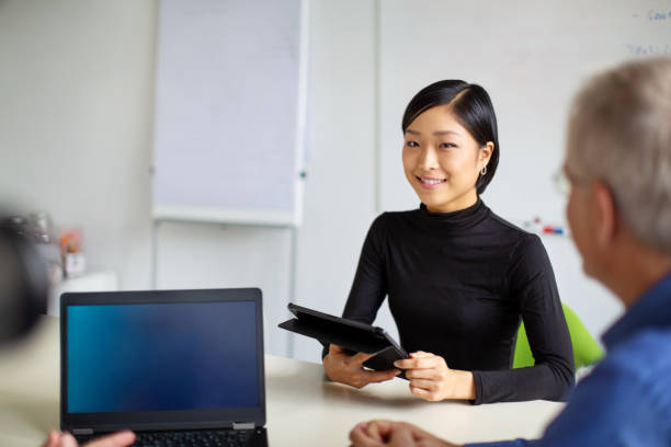 istock Multi-ethnic business team having a meeting in office 1212000954
