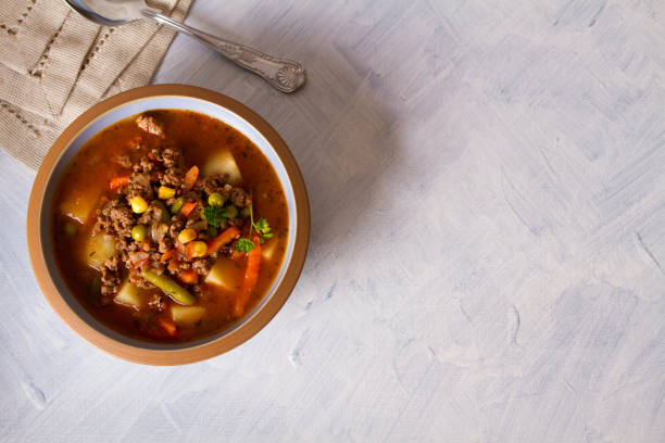 istock Bowl of ground beef soup with vegetables 1212003405