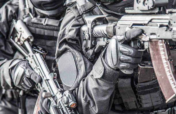 istock SWAT team fighters ready to arrest danger criminal 1212003746
