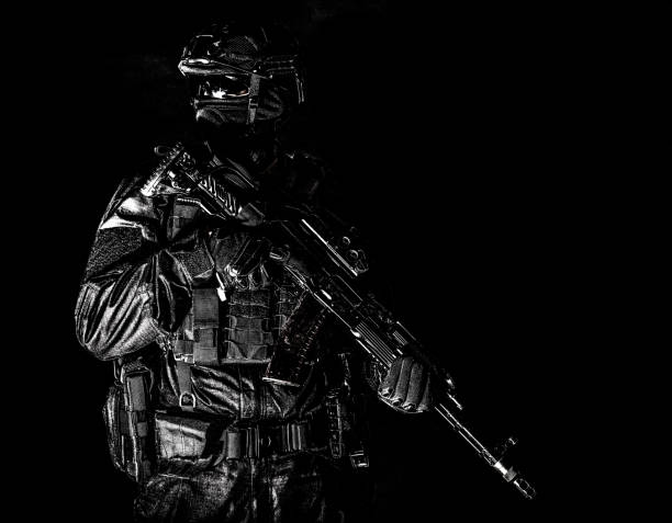 istock Equipped elite forces soldier low key portrait 1212004383