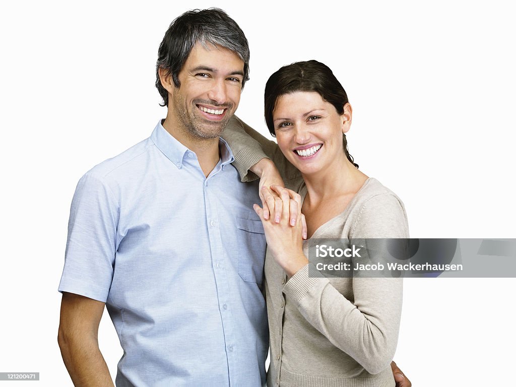 Älteres Paar geben Sie ein warmes Lächeln auf Weiß - Lizenzfrei Attraktive Frau Stock-Foto