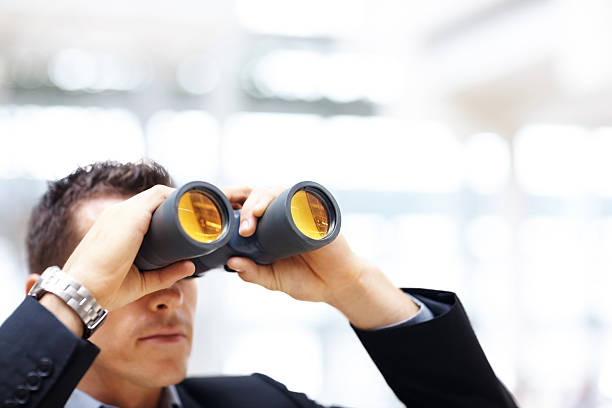 istock Business man with binoculars looking to the future 121200715