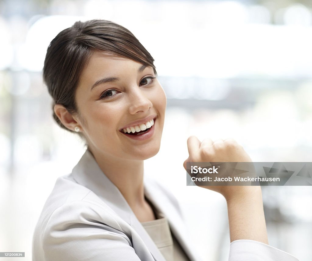 Cute young business woman smiling Closeup portrait of cute young business woman smiling Adult Stock Photo