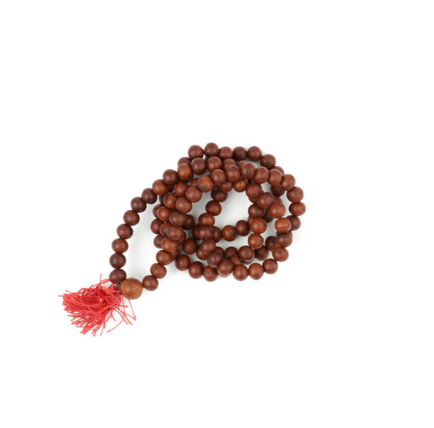 istock brown wooden prayer rosary, top view 1212010003