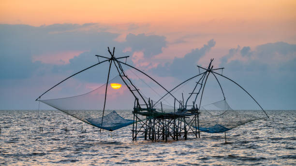 istock Square dip net with sunrise at Pakpra 1212010231
