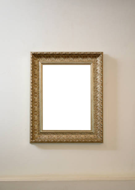 istock Antique gilded blank picture frame on wall 1212012845