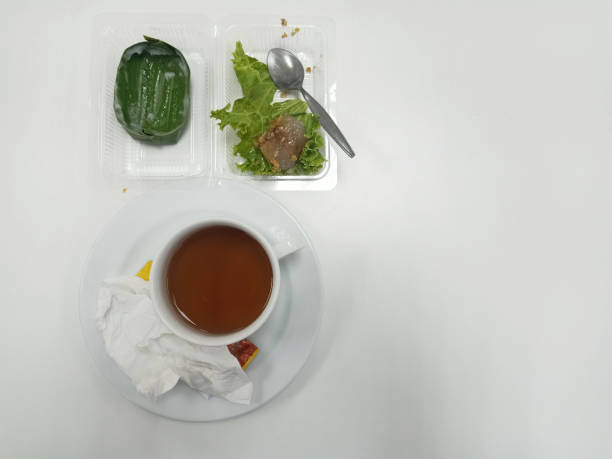istock The finished snack tray with a coffee mug on a white table 1212013144
