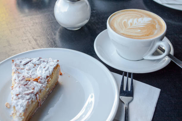 Cup of cappuccino and cake