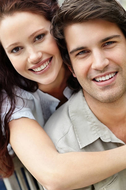 istock Cute female hugging a man from behind 121201370