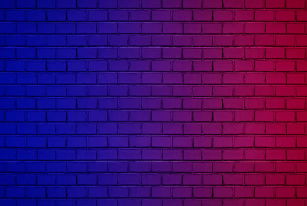 istock Abstract image Lighting Effect red and blue on black brick wall room for background or backdrop. concrete wall gradient color Effect background 1212017018
