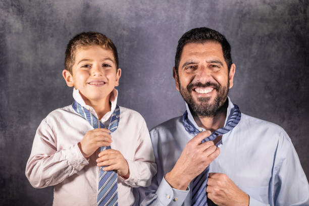 Gag gift for dad - tie with messages in blue gift box. Horizontal with copy space.