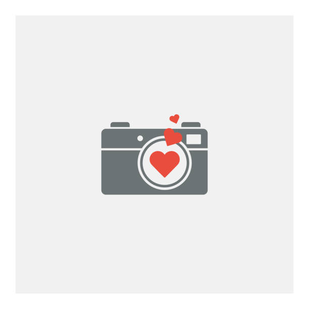 illustrazioni stock, clip art, cartoni animati e icone di tendenza di fotocamera vettoriale con simbolo di cuore - silhouette photographer photographing photograph