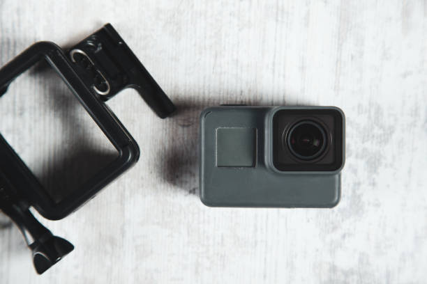 istock gopro on the white wooden desk 1212019309