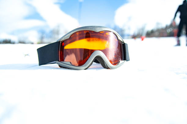 istock Ski and snowboard mask in the snow background 1212019370